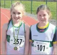  ?? ?? Carraig AC’s Isabelle Walsh and Caoimhe Hughes at the Moyne AC Open Sports Day in Tipperary.
