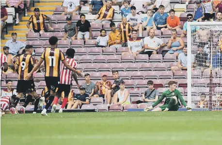  ?? ?? Emmanuel Osadebe puts Bradford City into the lead at Valley Parade.