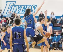  ?? BOB TYMCZYSZYN TORSTAR FILE PHOTO ?? Samuel Beifuss, going to the basket against Eden, is taking concurrent education at Brock University after graduating from Lakeshore Catholic.