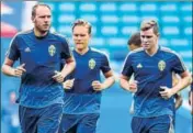  ?? AFP ?? Sweden skipper Andreas Granqvist (left) is the leading goalscorer for his side, having found the net twice so far.