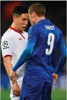  ??  ?? Samir Nasri and Jamie Vardy clash