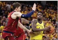  ?? AP/DARRON CUMMINGS ?? Victor Oladipo (right) of the Indiana Pacers heads to the basket as Cleveland’s Kyle Korver defends during the second half of Game 6 of Friday’s first-round playoff series in Indianapol­is. Oladipo had 28 points, 13 rebounds and 10 assists as the Pacers...