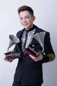  ??  ?? Wesley with his trophies, including the ‘Most Popular Award’ token, which he received from the ‘18th Astro Classic Golden Melody’ singing competitio­n.