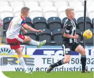  ??  ?? Bobby Barr scores the match’s final goal