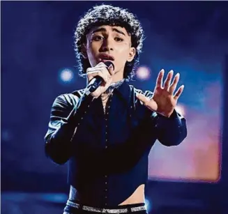  ?? Casey Durkin/NBC ?? Frank Garcia’s blind audition Monday earned him a spot on Team Dan + Shay. The son of Francisco “Paco” Garcia of the Latin Grammy-winning Costumbre sang Adele’s “Love in the Dark.”