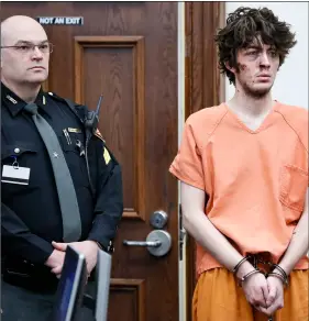  ??  ?? Suspect Wade Edward Winn (right) appears before Judge Kevin T. Miles at Clermont County Municipal Court into the shooting incident involving two officers of the Clermont County Sheriff’s Office, on Monday in Batavia, Ohio. AP PhoTo/John MInchIllo