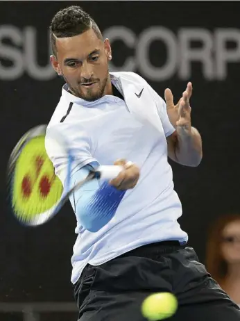  ??  ?? TOP SHOT: Nick Kyrgios whips a topspin return back to Matthew Ebden during their second-round match at the Brisbane Internatio­nal. PHOTO: TERTIUS PICKARD