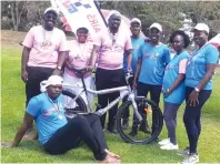  ?? ?? The Herald managing editor Ruth Butaumocho (second from left) and Zimpapers public relations and communicat­ions manager Pauline Matanda (second from right) pose for a photo with the 2023 Zimpapers Cancer Power Walk winner Tafadzwa Makwena, together with the team in Harare yesterday
SPEED BIKES