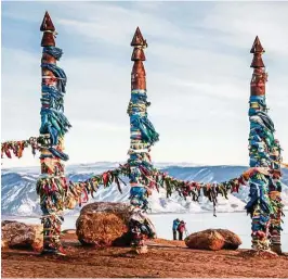  ??  ?? These wooden poles with ribbons show that shaman religions are still alive at Olkhon Island.