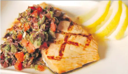  ?? ATCO BLUE FLAME KITCHEN ?? Salmon with Tomato and Olive Salsa is a Greek-inspired main dish.