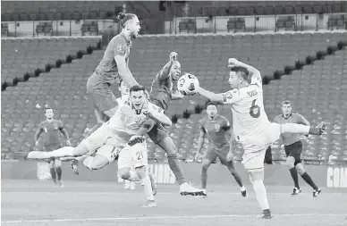  ?? — Gambar AFP ?? RANCAK: Babak aksi perlawanan kelayakan Piala Dunia 2022 di antara England dan San Marino di Stadium Wembley.