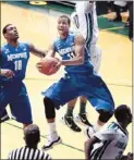  ??  ?? Memphis’ Wesley Witherspoo­n drives to the basket in front of Black on his way to a 10-point game.