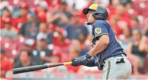  ?? DAVID KOHL/USA TODAY SPORTS ?? Brewers shortstop Willy Adames hits a ground rule double in the sixth inning Thursday.