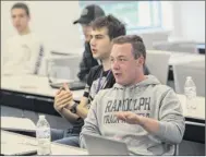  ?? Skip Dickstein / Times Union ?? Andrew Flynn, a freshman from Randolph, N.J., participat­es in Dean Robert Griffin’s introducto­ry class in Homeland Security at the University at Albany on Thursday in Albany.