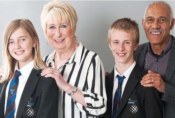  ??  ?? Firm friends: Kimberley, 13, and Marina with Jacub, 13, and Clive. Pairing teenagers with pensioners has been a success for both generation­s