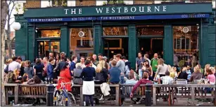  ??  ?? Fashionabl­e: Celebrity haunt The Westbourne pub in Notting Hill, West London