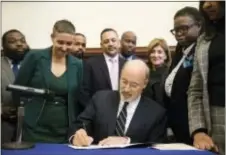  ?? MATT ROURKE — THE ASSOCIATED PRESS ?? Pennsylvan­ia Gov. Tom Wolf vetoes a bill passed by the Republican-controlled Legislatur­e to limit abortions to the first 20 weeks of pregnancy at City Hall in Philadelph­ia, Monday.