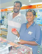  ?? Photo: Ministry of Women, Children and Poverty Alleviatio­n ?? Recipient of the Help for Home initiative Monika Laisa of Vutuni, Ba with her husband while purchasing hardware materials from RC Manubhai in Ba.