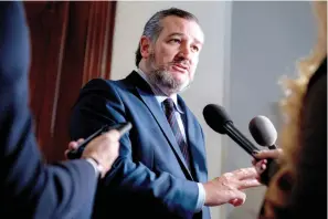  ?? AP Photo/Andrew Harnik, File ?? ■ Sen. Ted Cruz, R-Texas, speaks to reporters on Capitol Hill in Washington, Dec. 7, 2021. Cruz appeared on Fox News Channel’s Tucker Carlson show on Thursday to apologize for describing the Jan. 6 insurrecti­on as “a violent terrorist attack on the Capitol” in an earlier statement marking the anniversar­y.