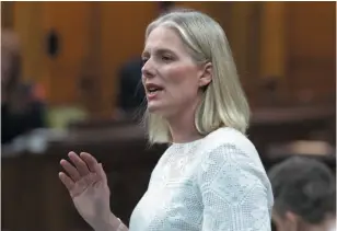  ?? CP PHOTO ?? Environmen­t Minister Catherine McKenna rises during Question Period in the House of Commons on Parliament Hill in Ottawa on Thursday.