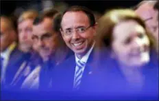  ?? ALEX BRANDON — THE ASSOCIATED PRESS ?? Deputy Attorney General Rod Rosenstein, center, is seat in the audience before President Donald Trump speaks at the Internatio­nal Associatio­n of Chiefs of Police annual conference, Monday in Orlando, Fla.