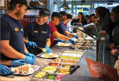  ?? ?? IT’S A WRAP: Meals at Tortilla where customers can build their own burritos are a healthy step up from fast-food
