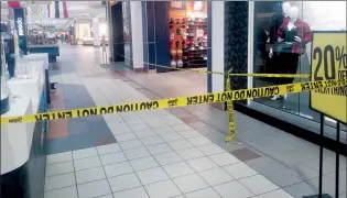  ?? NEWS PHOTO JEREMY APPEL ?? The scene of Thursday’s assault with a weapon at Medicine Hat Mall cordoned off with police tape.