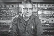  ?? BRIAN CASSELLA Chicago Tribune/TNS ?? Music producer Steve Albini in his Chicago studio in 2014. Albini, who produced albums by Nirvana, the Pixies and PJ Harvey, died Tuesday at age 61.