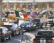  ?? Carolyn Cole Los Angeles Times ?? VEHICLES in Tijuana wait to enter the U.S. Border traffic was down significan­tly over the weekend.