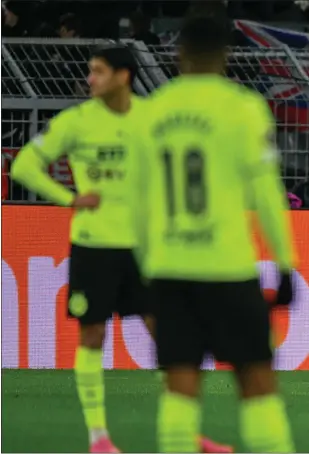  ?? ?? Dortmund were left dejected by the defeat to Rangers this week, but Paul Lambert (below left) feels they are still in the tie