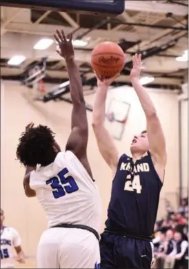  ?? PAUL DICICCO — FOR THE NEWS-HERALD ?? Kirtland’s Luke Camino shoots against Lutheran East on March 4.