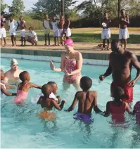  ??  ?? Minister Coventry takes to the swimming pool during the launch of the HEROES programme in Mutare recently.