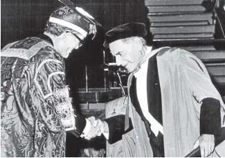  ??  ?? Sir Karl Popper gets an honorary degree from the University of Canterbury in 1973. He was also honoured by Oxford, Cambridge and numerous other institutio­ns. He was knighted in 1965.
