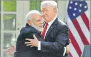  ?? REUTERS FILE ?? Hugging it out: Modi and Trump.