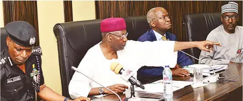  ?? PHOTO: PHILIP OJISUA ?? Inspector General of Police, Mohammed Adamu (left); Chief of Staff to the President, Abba Kyari; Minister of Works and Housing, Babatunde Fashola; and Group Managing Director of the Nigerian National Petroleum Corporatio­n (NNPC), Mele Kyari, during a stakeholde­rs’ meeting on distributi­on of petroleum products during the festive season at the State House, Abuja…yesterday.