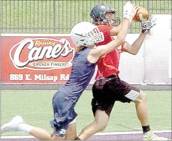  ?? SUBMITTED PHOTO ?? McDonald County wide receiver Cole DelosSanto­s catches a touchdown pass from Shiloh Jackson against Bentonvill­e West at a 7-on-7 camp at Fayettevil­le High School on July 14.