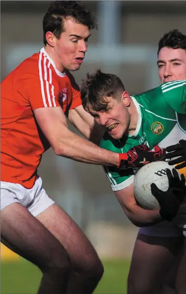  ??  ?? Conor Early, Fergal Donohoe and John Clutterbuc­k leave Johnny Moloney with nowhere to turn . Pics: Tom O’Hanlon