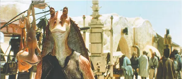  ?? LUCASFILM ?? Jar Jar Binks, who was voiced by Ahmed Best, looks a little peckish in 1999's critically panned Star Wars: Episode I - The Phantom Menace.