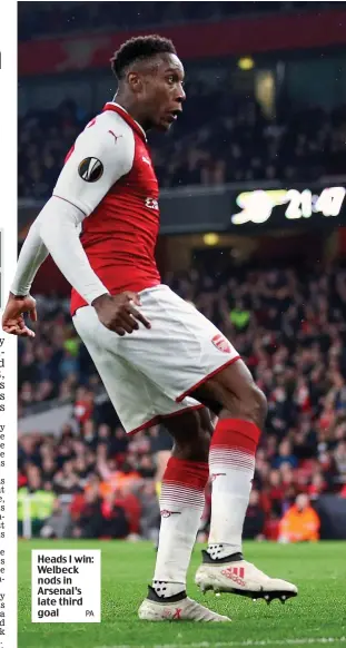  ?? PA ?? Heads I win: Welbeck nods in Arsenal’s late third goal