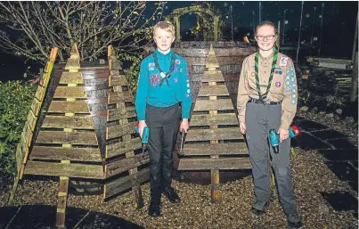  ?? Picture: Steve MacDougall. ?? Ailsa Bennet, 14, and brother Struan Bennet, 12, at work on one of their Christmas trees in Kinross.