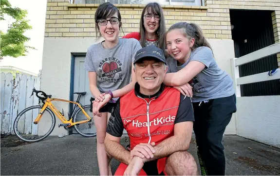  ?? ROBYN EDIE/STUFF ?? School teacher-cyclist Bryan McEwen has the support of his daughters Amelia, left, Claire and Merrin for the 280-kilometre Heart Kids Milford to Invercargi­ll Bike Ride on Saturday.