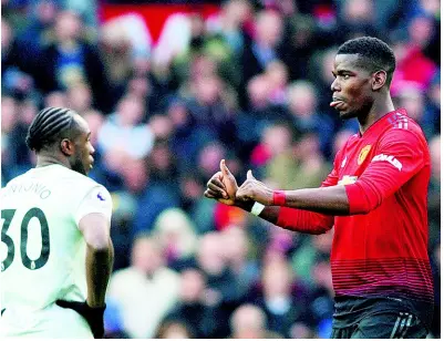  ?? AP ?? Manchester United’s Paul Pogba gestures after scoring his side’s second goal during the English Premier League match against West Ham United at Old Trafford yesterday. Manchester United won 2-1.