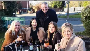  ??  ?? ●●Punters enjoy their first drinks in the Hinds Head.