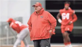  ?? CHARLIE RIEDEL/AP ?? Chiefs coach Andy Reid looks on during practice Thursday in Kansas City, Mo. The Chiefs will play the 49ers on Sunday in Super Bowl 58.
