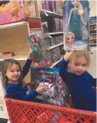  ?? COURTESY OF JILLIAN BEAM ?? With her $100 from Severna Park United Methodist Church, Jillian Beam took her daughters Hannah, 2, and Kennedy, 4, to pick out toys for children at Johns Hopkins Hospital.