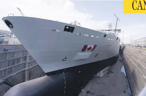 ?? JACQUES BOISSINOT / THE CANADIAN PRESS FILES ?? Royal Canadian Navy personnel will begin training on the Resolve-class naval support ship Asterix starting in January.