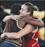  ?? Associated Press ?? Aryna Sabalenka (right) is congratula­ted by Coco Gauff after winning their semifinal match, 7-6 (2), 6-4, at the Australian Open on Thursday at Melbourne Park, Melbourne, Australia.