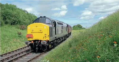  ?? Alistair Grieve ?? No. 37263 makes its first run in preservati­on, also the first time department­al grey has been carried by a preserved '37', at the Telford Steam Railway on June 13.