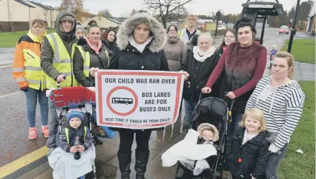  ??  ?? Barmston resident Vicky Walker, pictured with family and friends, has started a petition.