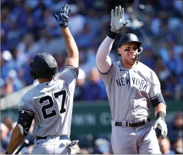  ?? JAMIE SQUIRE – GETTY IMAGES/TNS ?? The Yankees’ Aaron Judge, right, is congratula­ted by Giancarlo Stanton after hitting his second homer of the game Sunday.
